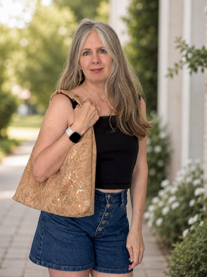 Model wearing the Slouchy Zipper Shoulder Bag in Premium Green Marble Cork
