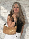 Natural Gold Fleck Cork Baguette Bag II worn carried in hand