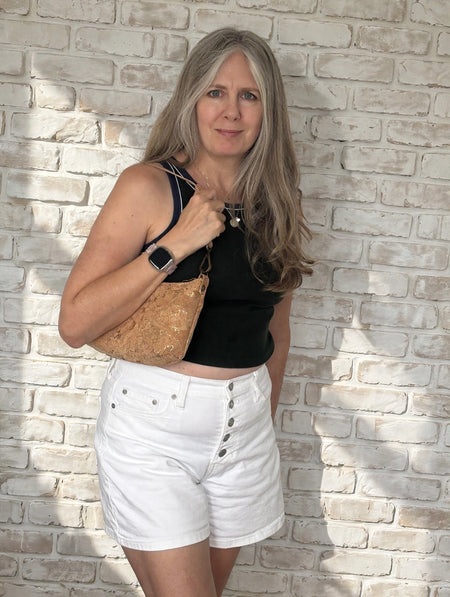 Natural Gold Fleck Cork Baguette Bag II worn as a shoulder bag