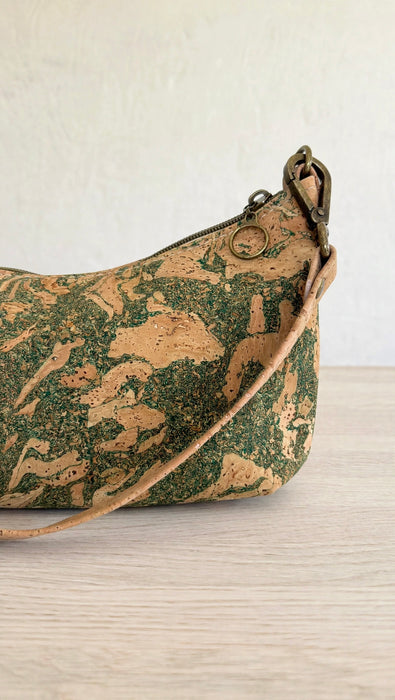 Close-up of green marble Portuguese cork infused with green tea

Interior: