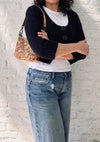 Natural Bits Cork Baguette Bag II worn as a shoulder bag