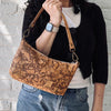 Natural Bits Cork Baguette Bag II carried in hand