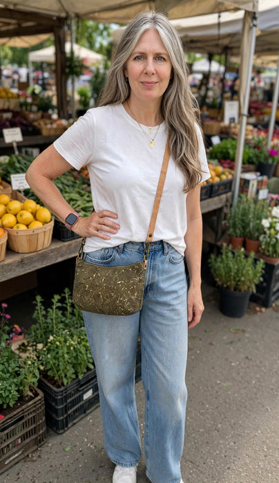 Dark Mosaic Baguette II cork bag worn crossbody with long strap