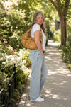 Light Mosaic Cork Crescent Slouchy Shoulder Bag worn on shoulder showing fit and size Spring Full View