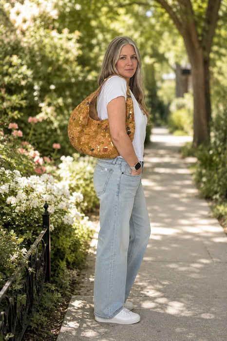 Light Mosaic Cork Crescent Slouchy Shoulder Bag worn on shoulder showing fit and size Spring Full View