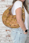 Light Mosaic Cork Crescent Slouchy Shoulder Bag worn on shoulder showing fit and size
