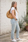 Light Mosaic Cork Crescent Slouchy Shoulder Bag worn on shoulder showing fit and size full view