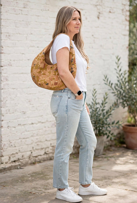 Light Mosaic Cork Crescent Slouchy Shoulder Bag worn on shoulder showing fit and size full view