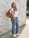 Natural Swirl Cork Crescent Slouchy Shoulder Bag worn on shoulder showing fit and size full size