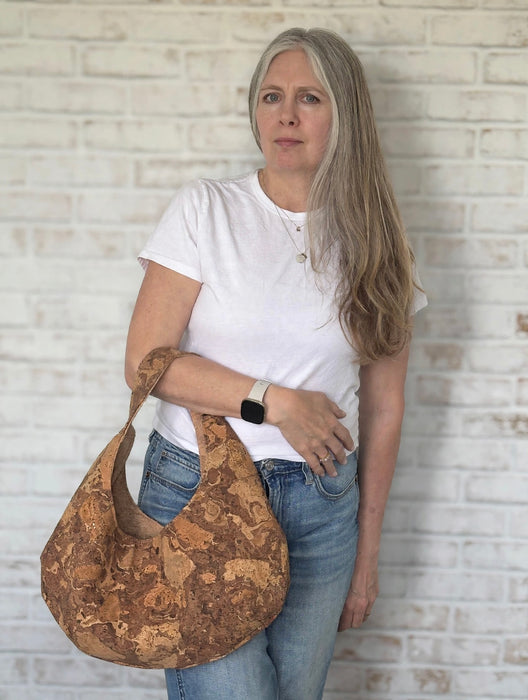 Natural Swirl Cork Crescent Slouchy Shoulder Bag worn on Arm showing size