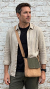 Olive Cork Everyday Crossbody Bag worn by male model showing fit and size