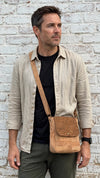 Toffee Cork Everyday Crossbody Bag worn by male model showing fit and size