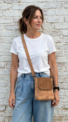 Toffee Cork Everyday Crossbody Bag worn by female model showing fit and size