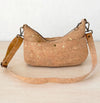 Back of medium gold fleck cork crossbody bag with exterior slip pocket