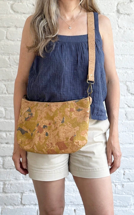 Medium light mosaic cork crossbody bag worn crossbody