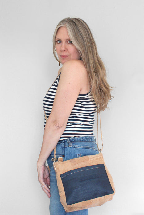 Small Zip Top Crossbody Backpack on a model