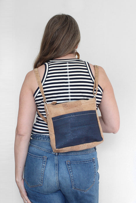Small Zip Top Crossbody Backpack on a model