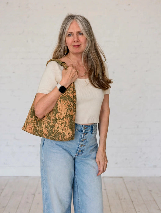 Green Marble Cork Slouchy Zipper Shoulder Bag worn on shoulder