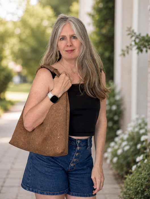 Slouchy Zipper Shoulder Bag worn on shoulder showing fit and size