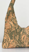 Front view of the Slouchy Zipper Shoulder Bag in Premium Green Marble Cork